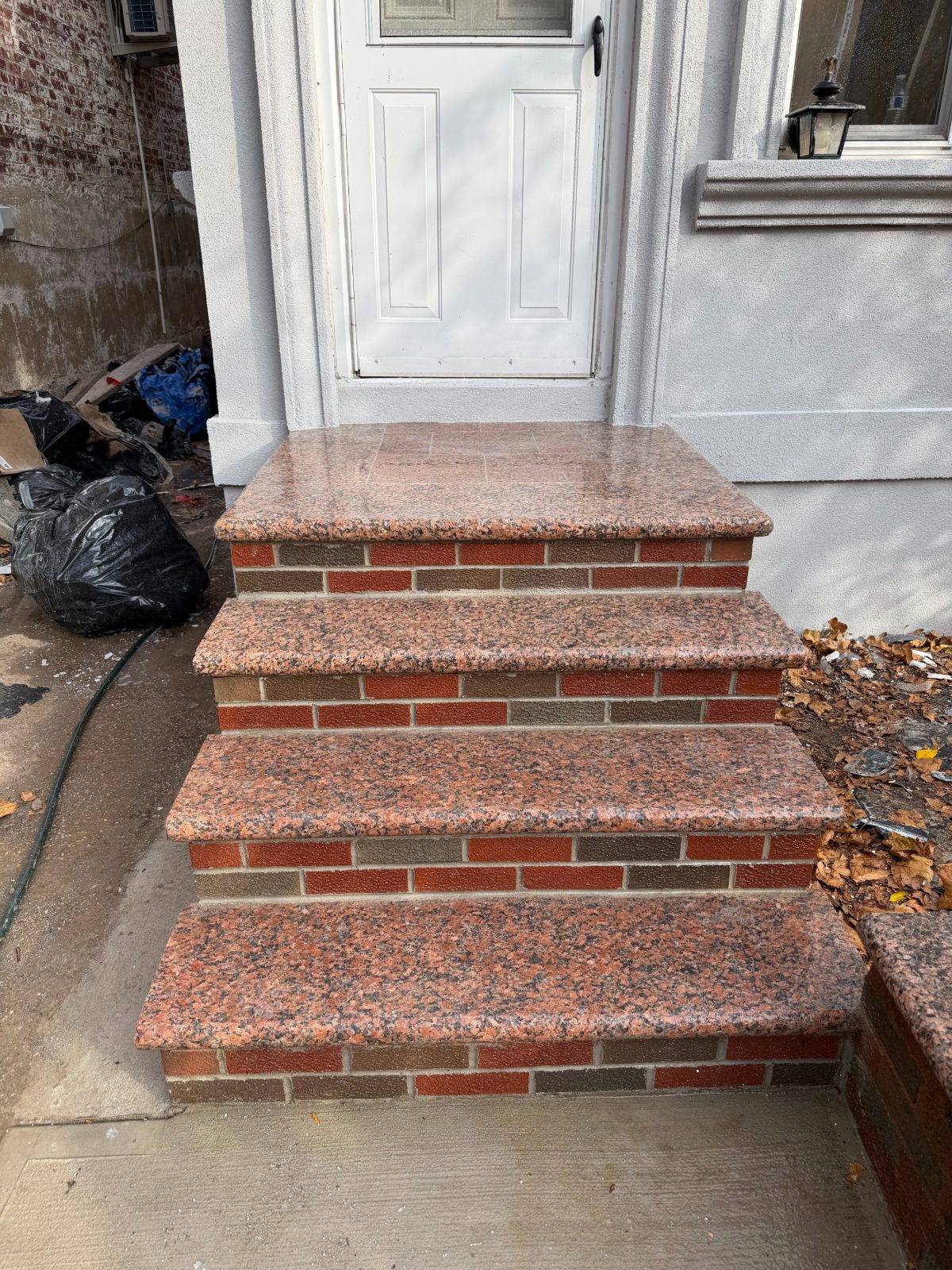 Finished granite and brick front steps